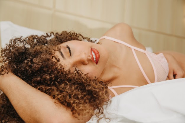 latin Dominican beautiful-young woman with curly hair